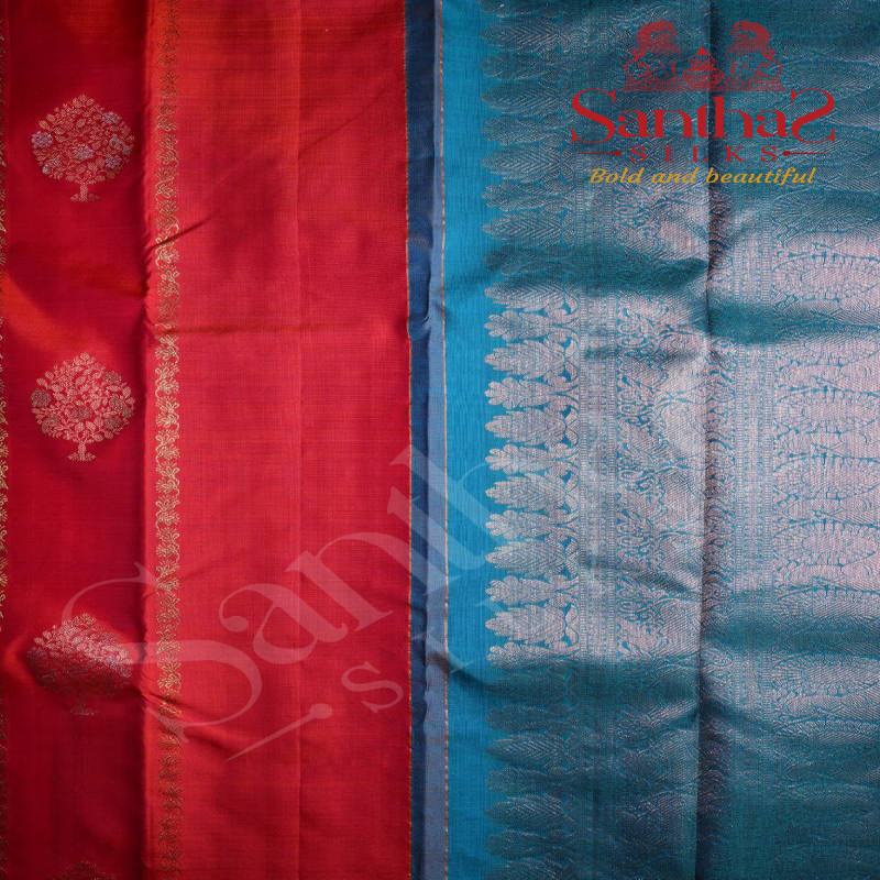 PINKISH ORANGE COLOUR BODY TREE BUTTA WITH CONTRAST BLOUSE