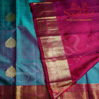 BLUEISH GREEN COLOUR BODY GOLDEN LEAF ZARI BUTTA WITH CONTRAST BLOUSE & BORDER