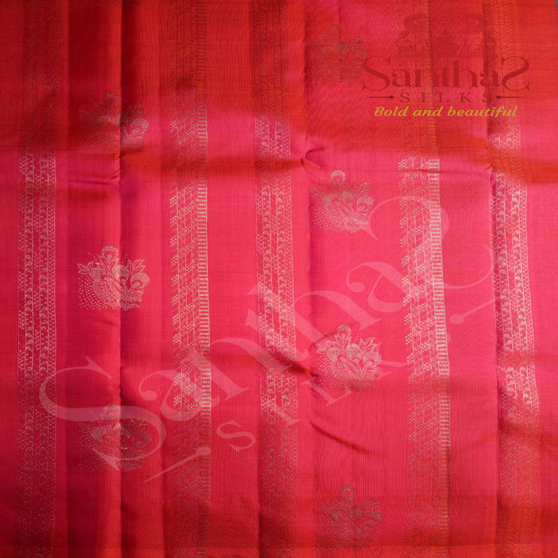 PINKISH ORANGE COLOUR BODY COPPER ZARI BUTTA WITH CONTRAST BLOUSE