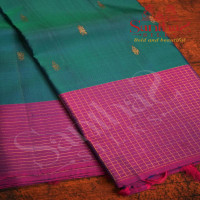 PEACOCK BLUE COLOUR BODY GOLDEN ZARI LEAF BUTTA WITH CONTRAST BLOUSE & BORDER