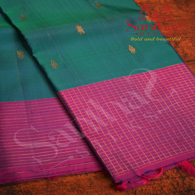 PEACOCK BLUE COLOUR BODY GOLDEN ZARI LEAF BUTTA WITH CONTRAST BLOUSE & BORDER