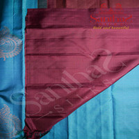 BORDERLESS RAMAR BLUE COLOUR BODY WITH STRIPS & BIG MOTIFS AND DARK BROWN COLOUR CONTRAST BLOUSE