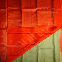 BORDERLESS PASTEL GREEN COLOUR BODY WITH ORANGE THREAD SMALL CHECKED BOXS & SMALL MOTIFS AND ORANGE COLOUR CONTRAST BLOUSE