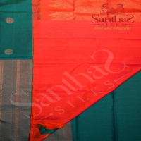 BORDERLESS PEACOCK BLUE COLOUR BODY WITH SILVER ZARI MOTIFS AND CONTRAST BLOUSE