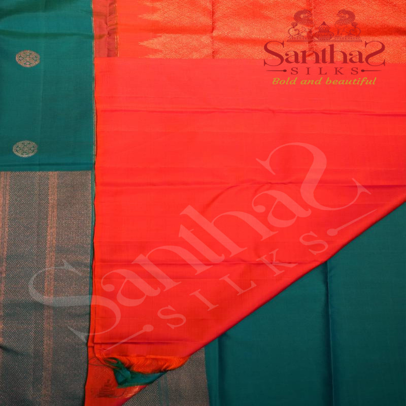 BORDERLESS PEACOCK BLUE COLOUR BODY WITH SILVER ZARI MOTIFS AND CONTRAST BLOUSE