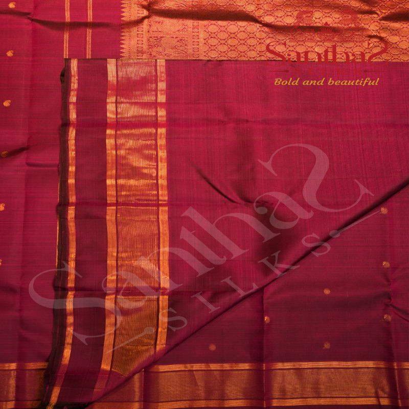 MAGENTA COLOUR BODY WITH GOLDEN ZARI MOTIFS AND SELF BLOUSE