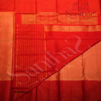 PEACH PINK COLOUR BODY WITH GOLDEN ZARI ANNAM CHAKKARAM MOTIFS AND CONTRAST RED BLOUSE