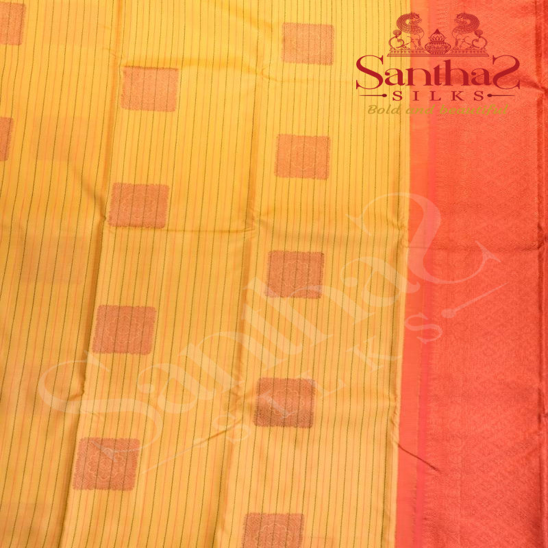 BORDERLESS PASTEL YELLOW COLOUR BODY STRIPS WITH COPPER ZARI MOTIF AND CONTRAST BLOUSE