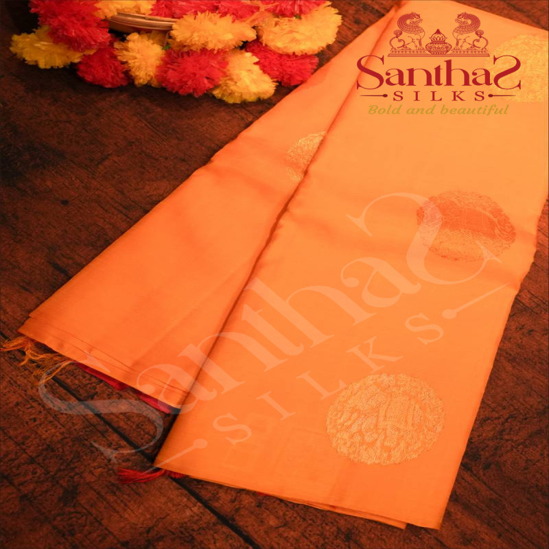 BORDERLESS MANGO YELLOW COLOUR BODY WITH SILVER, COPPER & GOLDEN ZARI ELEPHANT MOTIFS AND CONTRAST BLOUSE