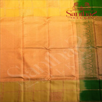 TEA GREEN COLOUR BODY WITH COPPER & SILVER ZARI FLOWER DESIGN AND CONTRAST BLOUSE