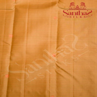 BORDERLESS MANGO YELLOW COLOUR BODY WITH STRIPS & SMALL BUTTAS IN COPPER ZARI AND CONTRAST BLOUSE