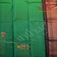 BORDERLESS FUN GREEN COLOUR BODY WITH MULTI COLOUR ZARI BIRD MOTIFS AND CONTRAST BLOUSE