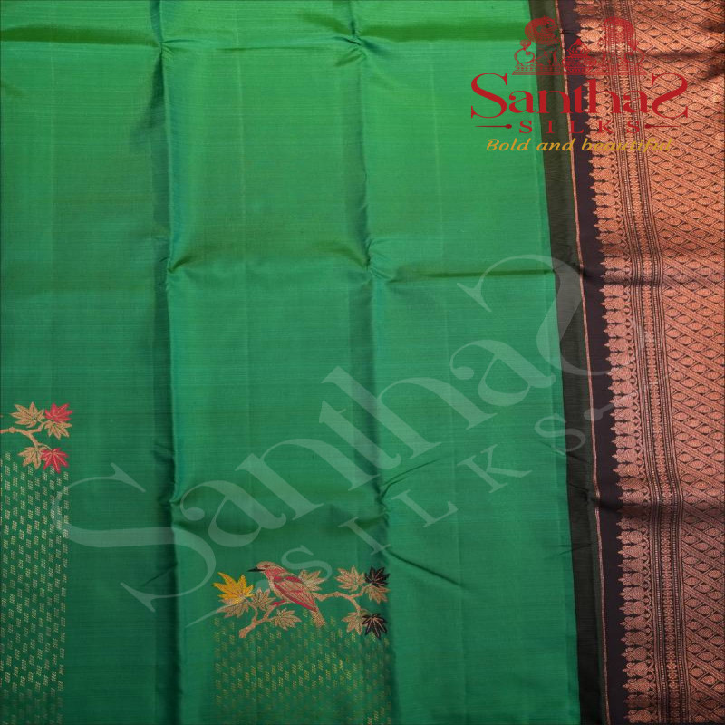 BORDERLESS FUN GREEN COLOUR BODY WITH MULTI COLOUR ZARI BIRD MOTIFS AND CONTRAST BLOUSE