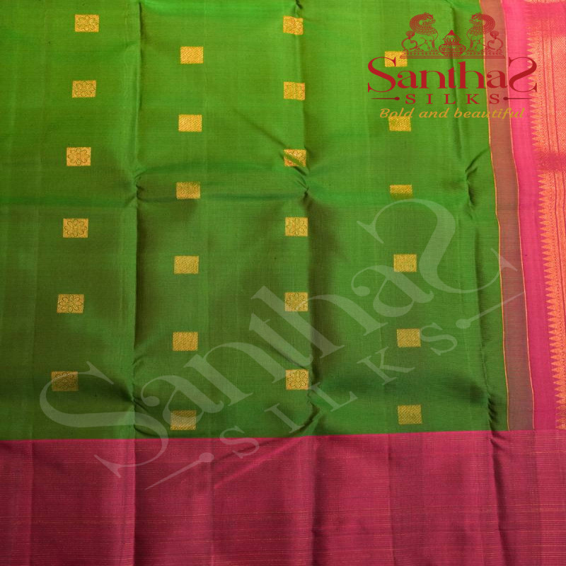 EMERALD GREEN COLOUR BODY WITH GOLDEN ZARI BUTTAS AND CONTRAST BLOUSE