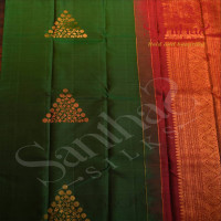 BORDERLESS BOTTLE GREEN COLOUR BODY WITH GOLDEN & COPEER ZARI TRIANGLE MOTIFS AND CONTRAST BLOUSE