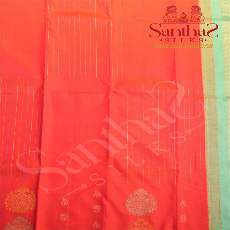 BORDERLESS ORANGISH PINK COLOUR BODY WITH MULTI COLOUR STRIPS & PEACOCK MOTIFS AND CONTRAST BLOUSE