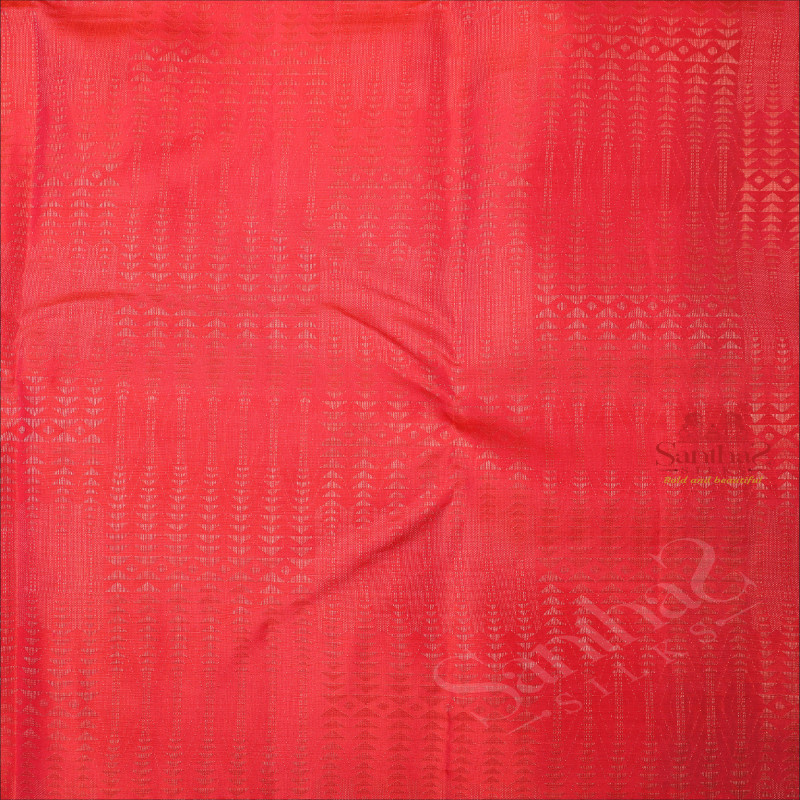 BORDERLESS RED ORANGE COLOUR BODY WITH ALL OVER BUTTA WITH CONTRAST BLOUSE