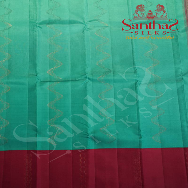 TIFFANY BLUE COLOUR BODY WITH ROSEGOLD ZARI IN KODI PATTERN AND CONTRAST BLOUSE