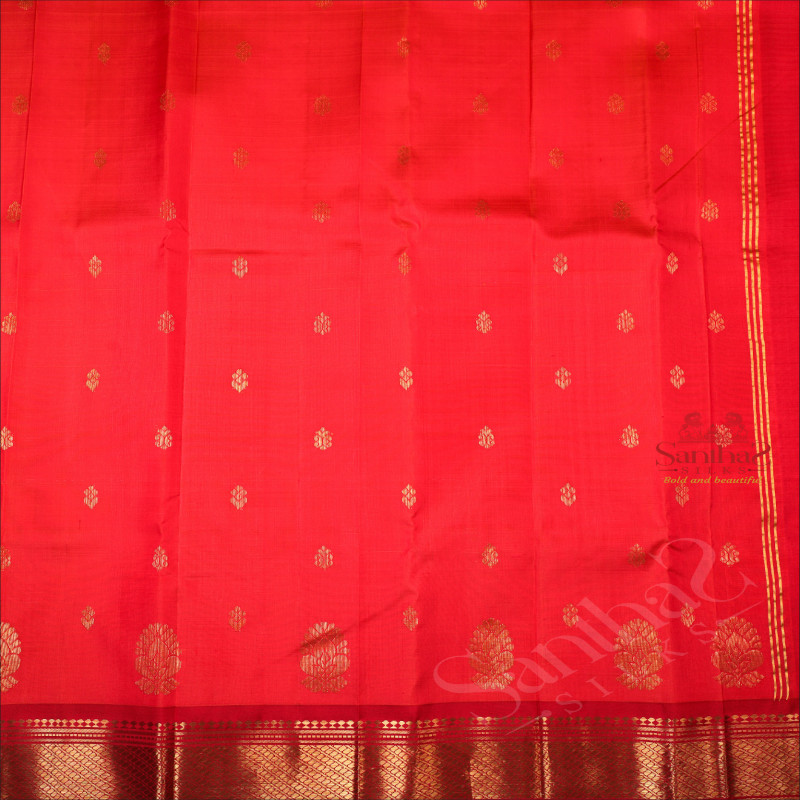 BORDERLESS ORANGISH RED COLOUR BODY WITH GOLDEN ZARI BUTTA & WITHOUT BLOUSE