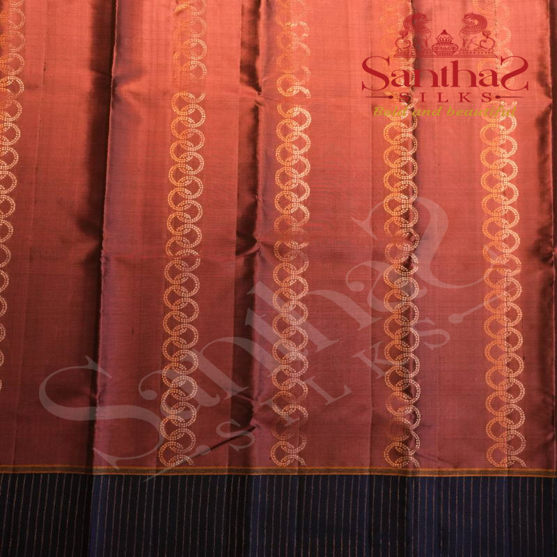 GARNET PINK COLOUR BODY WITH COPPER & SILVER ZARI OVERLAPED PATTERN AND CONTRAST BLOUSE
