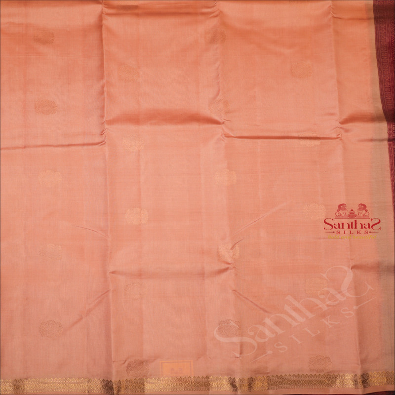 PASTEL PEACH COLOUR BODY WITH COPPER ZARI BUTTA & CONTRAST BLOUSE