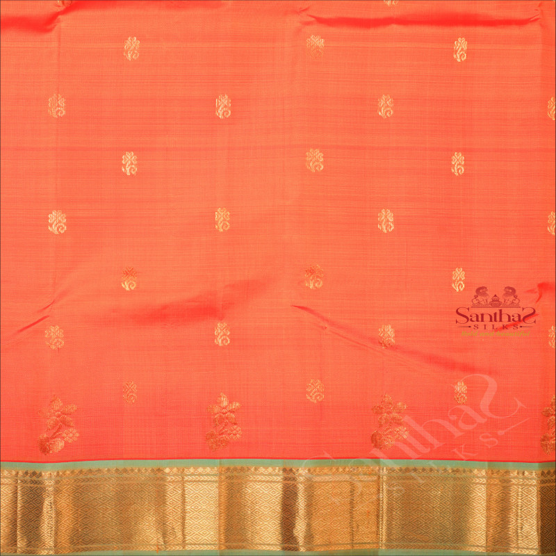 ORANGISH RED COLOUR BODY WITH GOLDEN ZARI BUTTAS & SINGLE SIDE BORDER AND CONTRAST PALLU WITHOUT BLOUSE