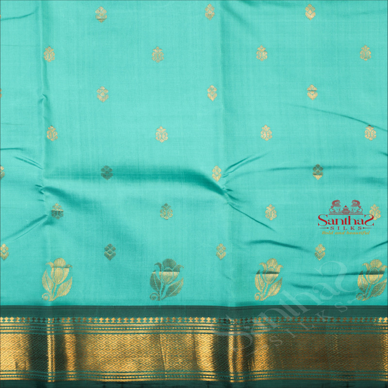 BRIGHT TEAL COLOUR BODY WITH GOLDEN ZARI BUTTAS & SINGLE SIDE BORDER AND CONTRAST PALLU WITHOUT BLOUSE