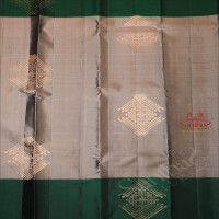 GREY COLOUR BODY WITH GOLDEN ZARI KOLAM BUTTA WITH CONTRAST BLOUSE & BORDER