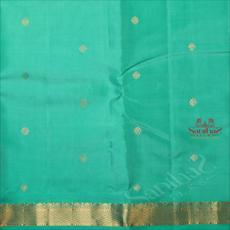 AQUA BLUE COLOUR BODY WITH SMALL BUTTAS AND SELF COLOUR PALLU WITH SELF COLOUR BLOUSE