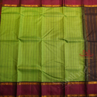 PISTHA GREEN COLOUR CHECKED BODY WITH CONTRAST BLOUSE & BORDER