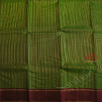 BOTTLE GREEN COLOUR BODY WITH SILVER & GOLD ZARI STRIPS AND CONTRAST COLOUR BLOUSE AND PALLU