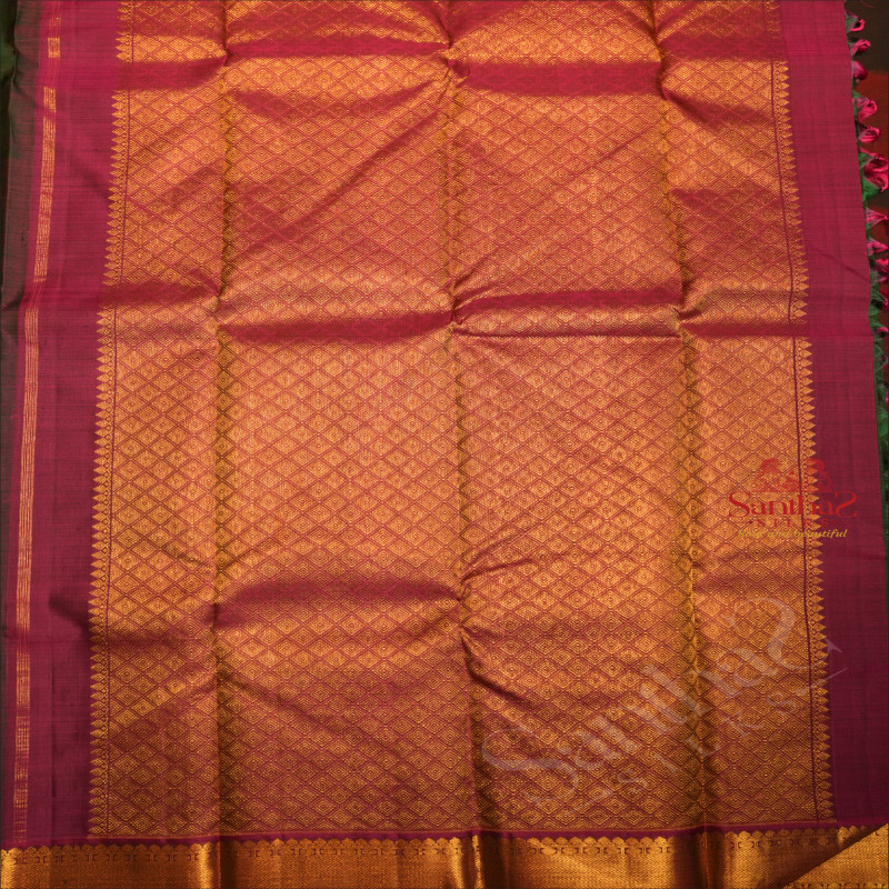 FOREST GREEN COLOUR BODY WITH GOLDEN ANNAM CHAKKARAM BUTTA WITH CONTRAST BLOUSE & BORDER