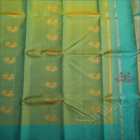 MINT AND TURQUOISE MIXED COLOUR BODY WITH GOLDEN ZARI PEACOCK MOTIFS AND CONTRAST COLOUR BLOUSE & PALLU