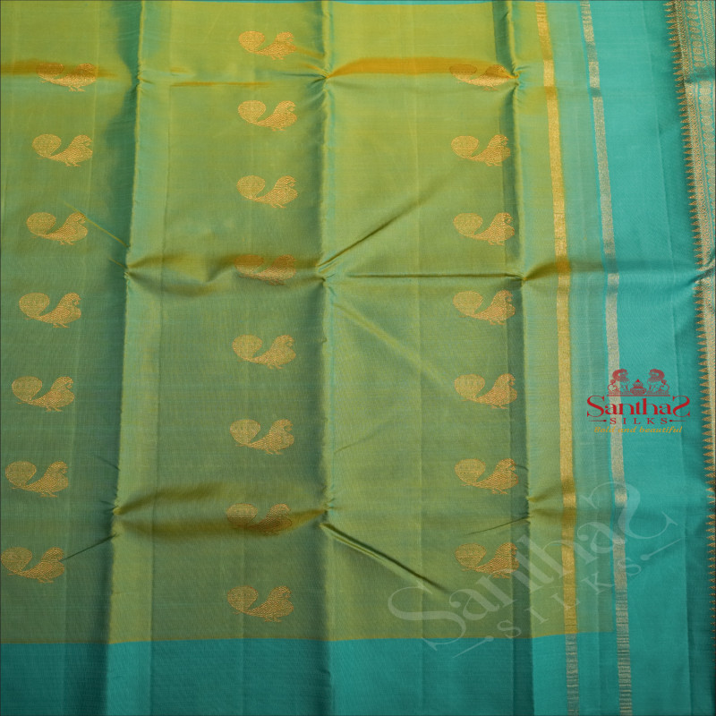 MINT AND TURQUOISE MIXED COLOUR BODY WITH GOLDEN ZARI PEACOCK MOTIFS AND CONTRAST COLOUR BLOUSE & PALLU