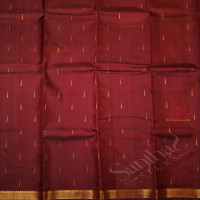 MAROON COLOUR BODY WITH GOLDEN ZARI MOTIF AND BORDER WITH SELF BLOUSE