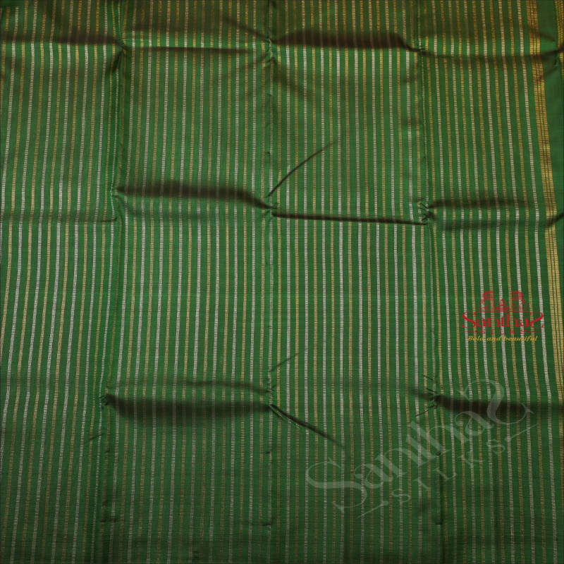 BOTTLE GREEN BODY WITH GOLDEN SILVER ZARI STRIPS WITH SELF BLOUSE