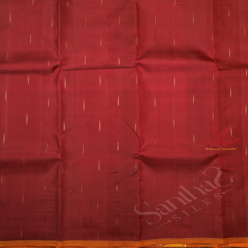 MAROON COLOUR BODY GOLDEN ZARI MOTIF WITH CONTRAST BLOUSE