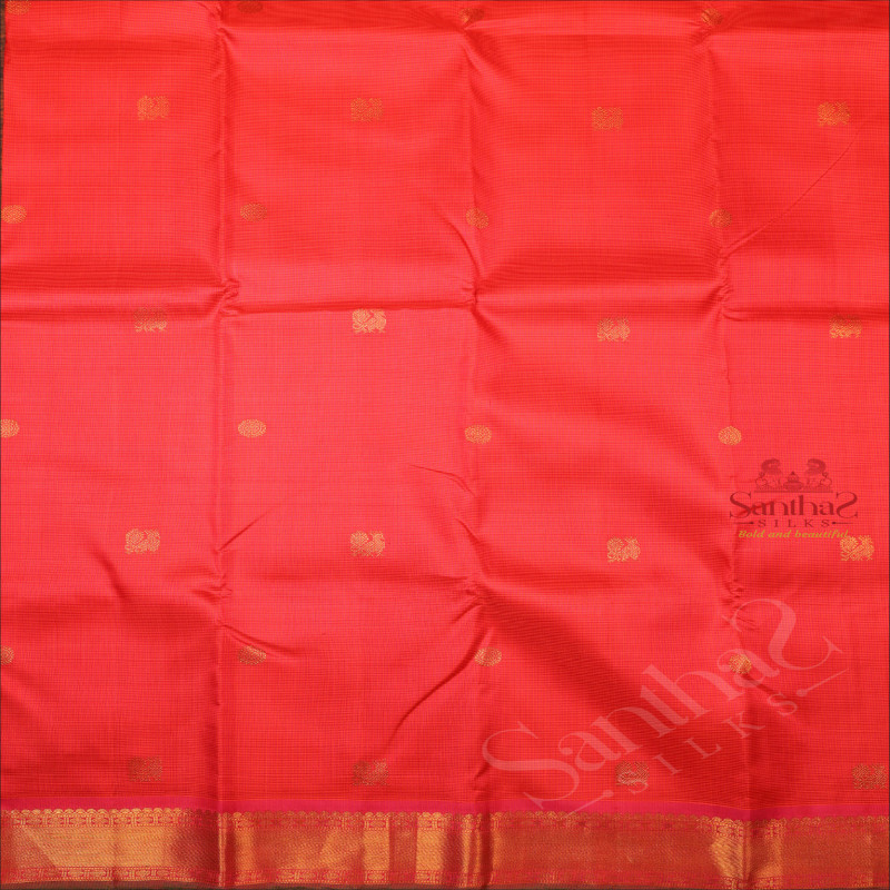 PINKISH PEACH COLOUR CHECKED BODY WITH GOLDEN ZARI ANNAM CHAKKARAM BUTTA WITH CONTRAST BLOUSE