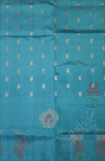 BOREDERLESS BLUE COLOUR BODY WITH SILVER ZARI PEACOCK BUTTA WITH SELF BLOUSE